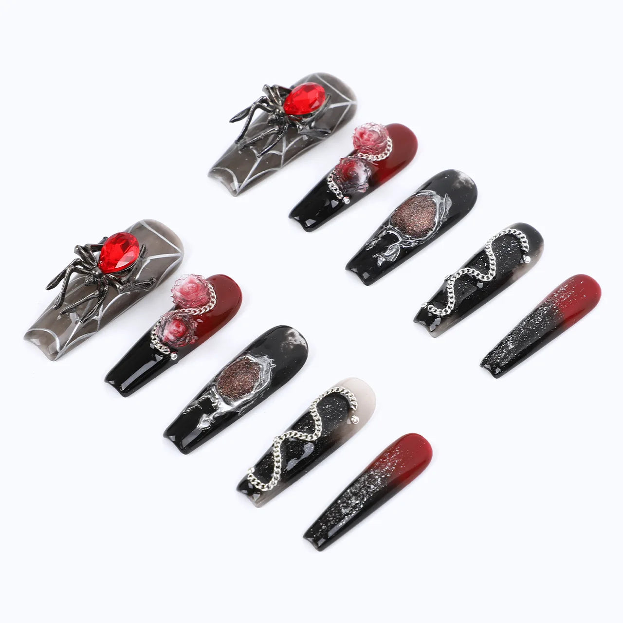 Close-up of 10 nails showing detailed glittery manicure, handmade 3D spider and diamond decorations with red and black sparkly colors