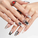 Medium Coffin Nude Pink Nails Designs with Spider Web is worn for display