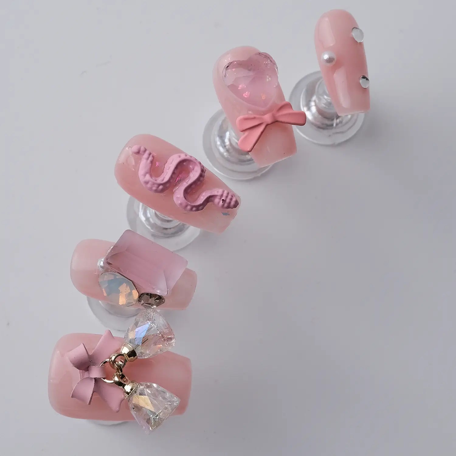 Detail of 5pcs Pink Candy Nails Short Coffin with Rhinestones and Bear Decoration