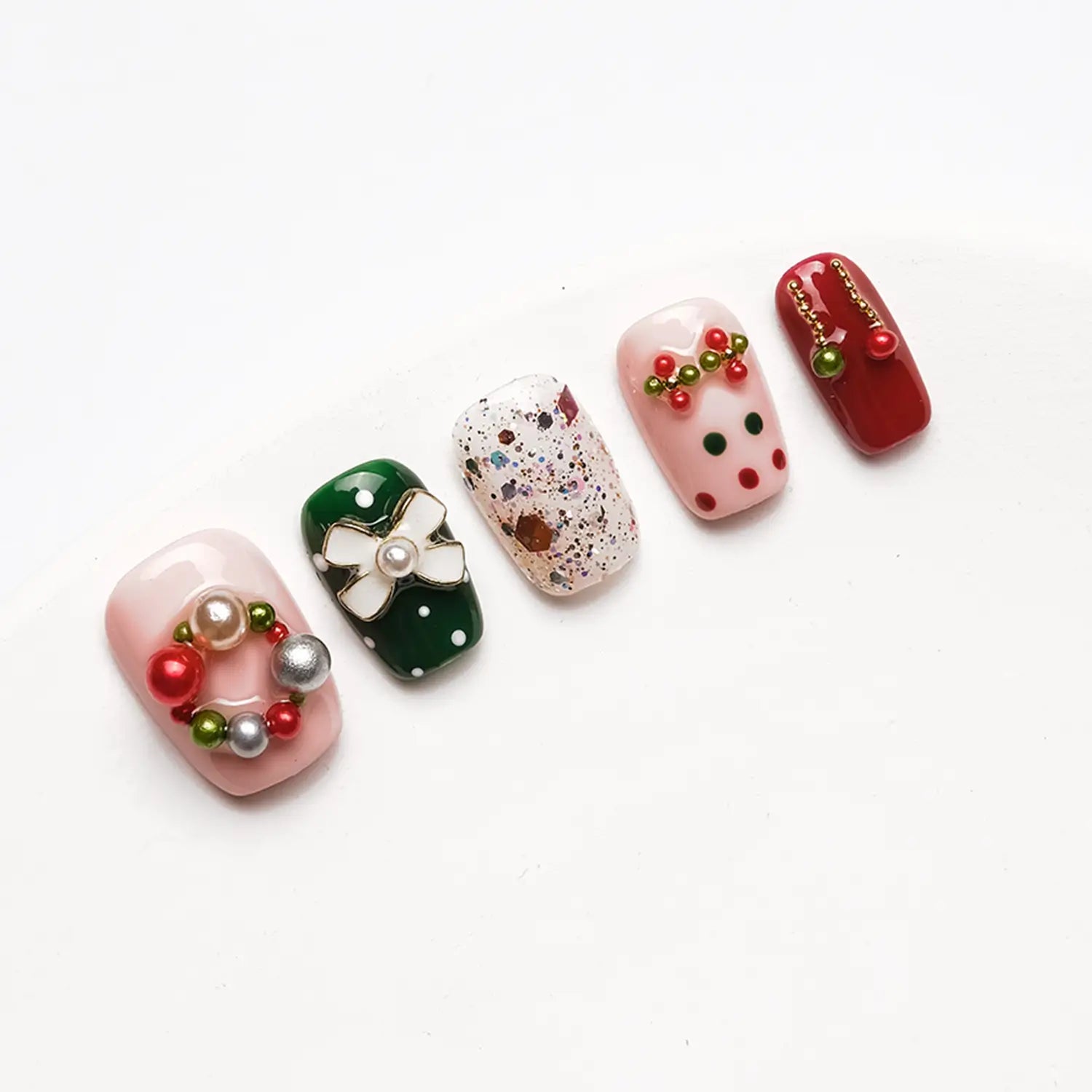 Short square christmas nails with red green and pink