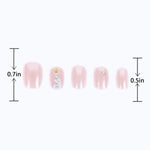 Size length of pearlescent pink nails with christmas tree