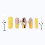 The length of press on nails glossy yellow french with 3D bow design